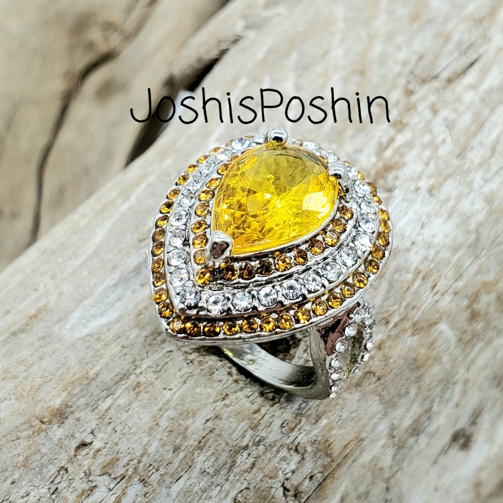 Silver pear shaped canary yellow citrine ring